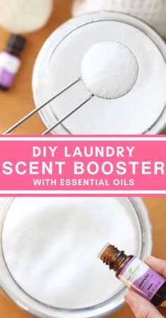 a hand holding a bottle of essential oils with the words diy laundry scent booster on it