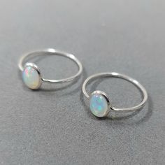 - PRODUCT TYPE - 925 SILVER OPAL SIMPLE RING - MATERIAL - SILVER - PURITY - 925 - TOTAL WEIGHT - 0.635 GRAMS - STONE WEIGHT - 0.55 CARATS - SILVER WEIGHT - 0.525 GRAMS Minimal & Simple, Dainty Handmade Bands.Understated Luxury. - Delicate Handmade Silver Ring. - Made to order, just for you. Anirudh Gems Store :- https://www.etsy.com/uk/shop/ANIRUDHGEMSStore?ref=search_shop_redirect -Quality is guaranteed. Our mission is always to satisfy our customers with our offerings, so just relax and pl Stackable Silver Opal Jewelry, Nickel Free Sterling Silver Opal Ring, Handmade Round Opal Ring, Handmade Sterling Silver Opal Ring, Oval Opal Ring Stamped 925, Nickel-free Opal Silver Ring, Adjustable Sterling Silver Round Opal Ring, Adjustable Sterling Silver Opal Ring, Nickel-free Opal Promise Ring