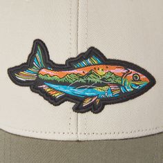 Hit the road or the nearest hike in our Trucker, the perfect companion for outdoor adventures near or far. 100% Cotton 8.26 oz. Structured front with firm mesh back Snapback with Life is Good® label on the back Six panel structured low-mid crown with six rows of stitching on the brim. Woven patch Imported | Life is Good Fish Mountain Scene Hard Mesh Back Cap in Bone Logo Patch Six-panel Baseball Cap For Outdoor, Outdoor Six-panel Trucker Hat With Logo Patch, Outdoor Trucker Hat With Logo Patch, Six-panel Baseball Cap With Logo Patch For Outdoors, Curved Bill Baseball Cap With Logo For Outdoor Activities, Logo Patch Baseball Cap For Outdoor Activities, Curved Bill Baseball Cap With Logo Patch For Outdoor, Curved Bill Baseball Cap With Logo For Outdoor, Trucker Hat With Logo Patch For Outdoor Activities