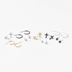 Show off your faith in style with this earring set! Featuring faux crystal crosses and balls, this set includes 6 pairs of stud earrings and 3 pairs of hoop earrings in black, gold, and silver-tone metal finishes. Finish: Mixed metal Closure: Post back Pack Size: 9 Material: Metal - Claire's Mixed Metal Crystal Cross Earrings Set - 9 Pack Size: one size.  Gender: female.  Age Group: adult. Crystal Cross, Cross Earrings, Mixed Metals, Earrings Set, Earring Set, Silver Tone, Jewelry Earrings, Hoop Earrings, Stud Earrings