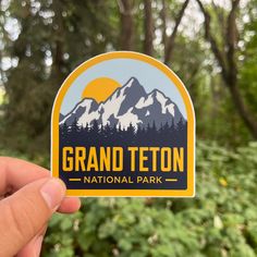 "Grand Teton National Park Sticker | Wyoming Sticker | National Park Gift | Grand Teton souvenir Dimensions: 3.5x3.5\" What can we say, we love the Tetons! So we have several stickers of the place... we'll probably have a few more added as time goes by, but we're pretty happy with this one! Our stickers have a beautiful matte finish, and feature a special laminate that protects them from exposure to wind, rain and sunlight. You can even put them in your dishwasher and have them come out looking National Park Tattoos, Places Illustration, National Park Gifts, Minimal Art, Laptop Decals, Car Bumper, Sticker Book, Laptop Decal, Car Window