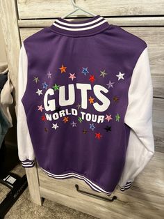 GUTS Tour Bomber Jacket, Custom Made!  70% polyester, 30% cotton Soft, lightweight, and comfortable.  Button closure, Two pockets, Rib Cuffs Purple The Man Jacket Eras Tour, Guts Tour Merch, Olivia Rodrigo Tank Top Guts Tour, Guts Spilled Olivia Rodrigo, Olivia Rodrigo Merch Guts, Guts Tour, Diy Bracelet Designs, Olivia Rodrigo, Bracelet Designs