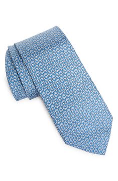 Interlocking Gancini bring geometric interest to this silk-twill tie that's made in Italy. 3" width; 59" length 100% silk Dry clean Made in Italy Blue Silk Suit And Tie Accessories For Work, Blue Silk Suit And Tie Accessories For Office, Blue Silk Ties For Work, Blue Silk Tie For Workwear, Designer Workwear Ties, Luxury Blue Silk Ties, Silk Twill, Silk Ties, In Italy