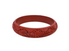 Antique Victorian Era Chinese DRAGON Red Lacquer Cinnabar Carved Wood Bangle Bracelet Condition:  Pre-owned, overall excellent!  Normal light wear commensurate with age. Measurements: Approximately 0.5 inches wide and 7.75 inches long Era 1890 to early 1900's Lovely antique Chinese export bangle bracelet, made in the late 19th century.  Finely carved wood with red cinnabar lacquer depicting a detailed figure of a long mythical dragon, flying in the clouds. FREE SHIPPING, US Only Thank you for looking and don't forget to check out my shop for additional fabulous finds~ Traditional Red Bangle For Formal Occasions, Ceremonial Red Adjustable Bangle, Adjustable Red Ceremonial Bangle, Adjustable Red Bangle For Ceremonial Occasions, Adjustable Red Bangle For Ceremonial, Dragon Flying, Mythical Dragons, Wood Bracelet, Red Lacquer