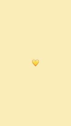 a yellow heart shaped object on a beige background