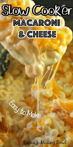 a spoon full of macaroni and cheese being lifted from a skillet with the words slow cooker macaroni and cheese easy to make