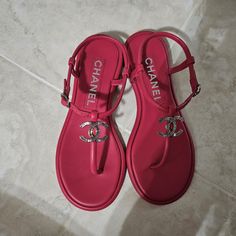 Authentic Chanel Thong Sandals Coco Mark Rose. Lambskin & Diamante Hot Pink Color Size 37c Brand New! Never Worn It. Designer Pink Sandals With Single Toe Strap, Luxury Toe Post Sandals, Pink Leather Toe Post Sandals, Pink Toe Post Leather Sandals, Luxury Pink Flat Sandals, Chanel Thong Sandals, Shoes Chanel, Hot Pink Color, Pink Chanel