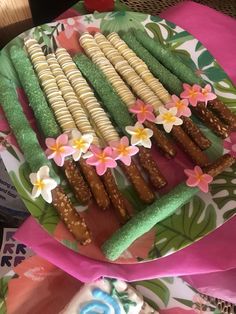 there are many different types of food on the plate, and one is decorated with flowers