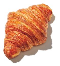 an orange croissant on a white background