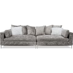 a gray couch with pillows on top of it