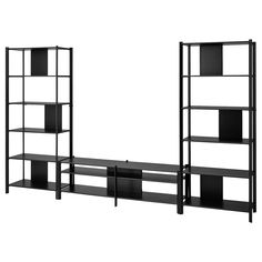 a black shelf unit with shelves and shelving units on each side, against a white background