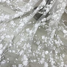 ❤Super gorgeous, exquisite embroidery flowers. Highly recommended to brides! ! ❤ Very delicate and romantic. It can be used for wedding decorations, boho dresses, bridal outfits, tops, clothing fabrics, corsets, curtains, etc... Size Width: 120cm (47.24 inches) This listing is for 1 yard. Wholesale Available If you need more, please feel free to contact me for a custom list. We usually process your order within 3-5 days, standard shipping will take about 10-15 days, some country may need more ti Wedding Lace Tulle Fabric With Floral Applique, Wedding Tulle Fabric With Floral Lace Embroidery, Lace Tulle Fabric With Floral Embroidery For Wedding, Delicate Floral Embroidered Tulle Fabric For Wedding, White Lace Tulle Fabric With Floral Applique, Delicate White Lace For Wedding Night, Delicate Floral Embroidery Lace For Wedding, White Lace Fabric With Floral Applique, Delicate White Wedding Dress For Bride