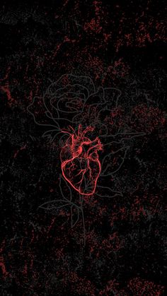 a red heart on a black background