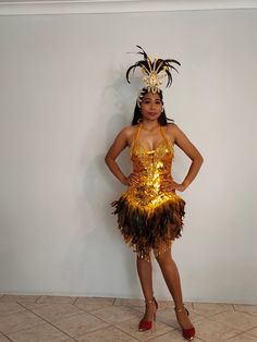 SAMBA FACTORY Lovely shaped handmade Sequin Dress with real Rooster Feathers. Open back, ropes tied at the back.  ( See pictures ) Perfect as a Samba or Dance competition Dress or for Clubbing an a night out ! This listing is for : GOLD color Sequins with GOLD Feather Dress, open back.  ( Please see all pictures ! ) We have many more colors of this gorgeous dresses in stock, please browse in our store ! Dress size : Fits AU/UK Size 8 / 10 / 12 !  Equivalent to US Size 4 / 6 / 8 ! The dress have Gold Fitted Flapper Dress For Costume Party, Gold Party Dress For Festivals, Gold Festival Party Dress, Fitted Gold Festival Dress, Gold Fitted Dress For Festival, Fitted Gold Costume For Costume Party, Glamorous Gold Dress For Festivals, Sequin Feather Dress, Carnival Show