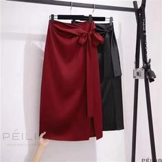 Peilia - High-Waisted, Red Satin Midi Skirt with a Long Asymmetric Hem and Flattering Hip-Hugging Silhouette Red Asymmetrical Skirt For Evening, Elegant High Waist Red Skirt, Elegant Long Red Pencil Skirt, Elegant Red Long Pencil Skirt, Elegant Asymmetrical Skirt Solid Color, Elegant Asymmetrical Skirt In Solid Color, Elegant Asymmetrical Solid Color Skirt, Elegant Red Asymmetrical Skirt, Elegant Red Skirt