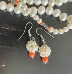 "WHITE FRESHWATER PEARL EARRINGS WITH FAUX CORAL BEADS APPROXIMATELY 1.5\" LONG SILVER EARWIRES FRESH WATER PEARLS COME IN A WIDE VARIETY OF COLORS, SIZED, AND SHAPES  THEY ARE VERY POPULAR FOR JEWELRY MAKING AND CREATING ART OBJECTS CHECK OUT MY OTHER ONE-OF-A-KIND GEMSTONE CREATIONS HERE:  https://www.etsy.com/your/shops/TwoPetalsArt" Red Coral Earrings, Black Pearl Necklace, Silver Pearl Earrings, Turquoise Drop Earrings, Freshwater Pearl Earrings, Coral Earrings, White Freshwater Pearl, Art Objects, Pearl Earrings Dangle