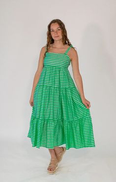 Archie Gingham Dress – Twirl Boutique Gingham Sundress For Spring, Casual Green Cotton Maxi Dress, Summer Gingham Tiered Dress, Summer Tiered Gingham Dress, Tiered Gingham Dresses For Summer, Casual Gingham Tiered Dress, Casual Tiered Gingham Dresses, Gingham Fitted Dress For Vacation, Fitted Gingham Dress For Vacation