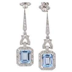 8.25 Carat Blue Topaz Drop Earrings 18k White Gold 66 Diamonds - 0.94 Carat 6gr per Earring Luxury Blue Topaz Dangle Earrings, Elegant Blue Gia Certified Diamond Earrings, Classic Blue Platinum Earrings, Elegant Blue Platinum Earrings, Luxury Platinum Blue Earrings, Luxury Blue Platinum Earrings, Blue Gia Certified Diamond Earrings For Wedding, Fine Jewelry Light Blue Earrings For Formal Occasions, Light Blue Fine Jewelry Earrings For Formal Occasions