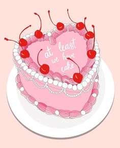 a pink heart shaped cake with cherries on top and the words at least we have cake