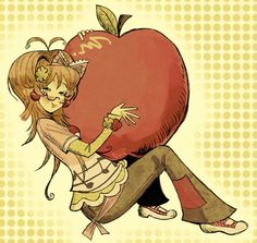 a girl hugging an apple with her hand