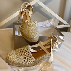 Pretty Cream Espadrilles With Gold Metallic Threading. Pinaz Size 40 (9.5-10 Us). Never Worn, New In Box (Can Be Shipped W/Box If Requested). Casual Lace-up Wedge Sandals With Removable Insole, Casual Cream Lace-up Espadrilles, Cream Straw Espadrilles With Round Toe, Cream Round Toe Straw Espadrilles, Cream Closed Toe Espadrilles For Vacation, Lace-up Straw Espadrilles For Spring, Lace-up Espadrilles With Cushioned Footbed For Beach, Spring Lace-up Straw Espadrilles, Summer Cream Closed Toe Espadrilles