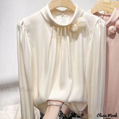 Olivia Mark - Beautiful Long-Sleeved Shirt with Artificial Silk Texture and Floral Design Cream Long Sleeve Tops For Work, Elegant Cream Long Sleeve Tops, White Long Sleeve Top For Formal Occasions, Elegant Long Sleeve Cream Tops, Long Sleeve Chiffon Shirt, Shirt Folding, Shirt Blouses Women's, Elegant Blouses, Chiffon Long Sleeve