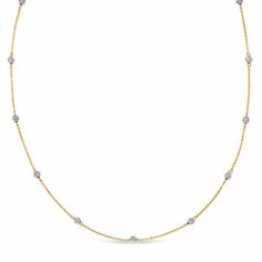 An elegant choice for day or night, this slender necklace glimmers with refinement. Fashioned in 14K two-toned gold, this sophisticated design sparkles with petite diamond-cut beads in cool white gold stationed along a yellow gold chain. Buffed to a brilliant luster, this 16.0-inch necklace with 2.0-inch extender secures with a spring-ring clasp. Station Necklace, Yellow Gold Chain, Sophisticated Design, Diamond Cut, Necklace Designs, Spring Rings, Gold Chain, Gold Chains, Types Of Metal