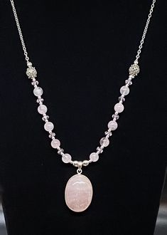 From my Pretty Pendants collection, this handmade necklace of approximately 19 1/2 inches plus pendant drop features a simple rose quartz cabochon encased in sterling silver strung with rose quartz, faceted pink and sterling silver beads.  This array of beads hangs from a sterling silver chain. Silver Jewelry With Rose Quartz Gemstone Beads, Silver Rose Quartz Jewelry With Gemstone Beads, Silver Rose Quartz Healing Necklaces, Handmade Silver Crystal Necklace With Rose Quartz, Simple Rose, Pretty Pendant, Rose Quartz Beads, Quartz Beads, Quartz Rose