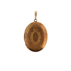 A vintage gold tone oval locket pendant. The gold plating shows quite a bit of wear but it gives it a great vintage look. Including the bail, the piece is a little over 1.5 inches long. Antique Gold Locket Necklace Pendant, Antique Gold Pendant Locket Necklace, Heirloom Style Oval Pendant Locket Necklace With Vintage Charm, Vintage Gold Locket Necklace For Formal Occasions, Gold Locket Necklace With Antique Finish And Round Pendant, Vintage Gold Jewelry With Oval Pendant, Classic Gold Locket Necklace With Oval Pendant, Gold Pendant Locket Necklace With Vintage Charm, Vintage Gold Pendant Locket Necklace