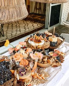 a table topped with lots of different types of food