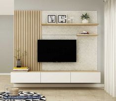 a living room with a tv and some shelves on the wall in front of it