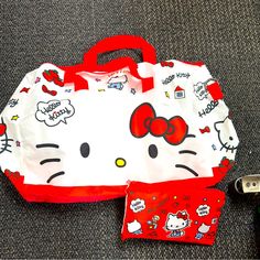 New Hello Kitty Nylon Bag Can Be Travel Bag, Tote Very Pretty Size 22.5”W X 13.5”H. Also There’s A Small Bag So You Can Put The Bag Inside White Hello Kitty Bag For Daily Use, Hello Kitty Red Bag For Everyday Use, White Hello Kitty Print Bag For Daily Use, White Hello Kitty Print Shopping Bag, Red Hello Kitty Travel Bag, White Hello Kitty Shopping Bag, Trendy White Hello Kitty Bag, Casual White Hello Kitty Shoulder Bag, Red Nylon Shopping Bag