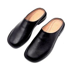 Materials: 100% Genuine Leather Sole: Comfort-contoured Heel: Flat Fit: Snug  Size Chart: For sizing information, please see the size chart included in the picture gallery or use online shoes size converter https://www.gigacalculator.com/converters/shoe-size-converter.php Elevate your style with these sleek Leather Mules for Women: Flat Shoes for Women, Gift for Women  The modern square-toe design adds a touch of sophistication, while the smooth leather construction ensures comfort and quality.  These versatile flats are perfect for dressing up or down, making them a must-have for any wardrobe.  Walk confidently in style with these black leather mules! Closed Toe Faux Leather Mules For Work, Faux Leather Closed Toe Mules For Work, Workwear Closed Toe Faux Leather Mules, Closed Toe Faux Leather Mules For Office, Black Round Toe Slippers For Work, Closed Toe Slip-on Slippers For Work, Slip-on Closed Toe Slippers For Work, Casual Business Mules With Leather Footbed, Casual Leather Mules With Square Toe