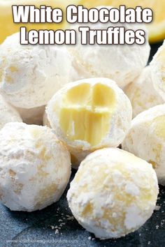 lemon meringue truffles are piled on top of each other