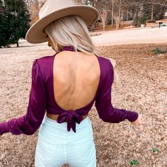 Woman outdoors fa ring backwards showing a purple open-back top while wearing a hat. Silk Bodysuit, Baby Got Back, Reversible Top, Ribbed Knit Top, Tie Styles, Purple Silk, Purple Top, Plum Purple, Satin Silk