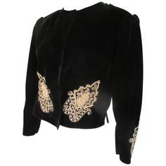 Unique vintage coat made of black velvet with gold embroidered items on front, sleeves and the back. It has 4 velvet buttons, no pockets and shoulderpads Size is about medium/large, please refer to the measurements in the description. Please note that vintage items are not new and therefore might have minor imperfections Embroidered Items, Embroidered Coat, Embroidered Jacket, Vintage Coat, Black And Gold, Black Velvet, Put On, Unique Vintage, Vintage Items