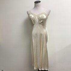 Vintage Silk Lace Long Chemise/ Gown..Totally Beautiful Feminine And Lots Of Pretty Details Spaghetti Straps No Tags On This Piece Length 42 Bust 40 It Is Loose On This Mannequin Which Is Size 4.(S) Should Fit Size Medium Elegant Beige Nightgown For Sleep, Elegant Beige Nightgown, Cream Feminine Slip Dress For Daywear, Feminine Cream Slip Dress For Daywear, Cream Camisole For Wedding Night, Cream Slip Dress For Daywear, Cream Silk Sleepwear, Sheer Cream Nightgown For Sleep, Vintage Slip Dress For Wedding Night