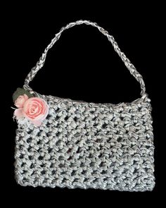 Metallic silver yarn bag  IT girl bag handcrafted silver yarn bag, made by myself with love ♡. Versatile and chic, it's the perfect accessory to enhance any outfit. The sparkly foil effect yarn ✨adds a touch of glamour, whether you're dressing up for a special occasion or adding a lil shine ✨ to a casual look. This bag effortlessly combines fashion and function. ♡ minimalist design ♡ spacious- fits all your essentials  ♡ handcrafted with care  ♡ designed to make a statement this silver yarn bag is a must-have addition to your accessory collection get in touch to explore custom variations of this bag ♡ Handmade Silver Shoulder Bag For Everyday Use, Silver Handmade Shoulder Bag For Everyday Use, Handmade Silver Shoulder Bag As Gift, Handmade Silver Shoulder Bag, Silver Handmade Party Bag, Handmade Silver Bag For Everyday Use, Silver Handmade Bag For Everyday Use, Handmade Silver Bags For Everyday Use, Lil Shine