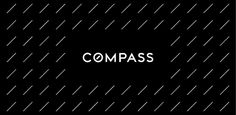 the words compass written in white on a black background