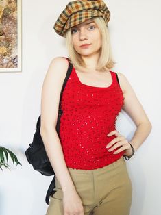 90's Vintage sequin beaded knit top in red Top is in great vintage condition. SIZE. Model usually wears UK 6, top could fit UK 6-8. Fabric is stretch. Please, check the measurements before buying. MEASUREMENTS. Bust - 70 cm, length - 54 cm. Item is made from mixed material. Color may differ slightly depending on the color calibration of the device you're viewing on. If You have more questions about products or shipping, please drop me a message. Wish You great shopping, Mellina Red Sleeveless Tops For Party Season, Glamorous Red Sequin Top, Glamorous Red Tops For Party Season, Glamorous Red Top For Party Season, Y2k Fitted Party Tops, Red Embellished Sleeveless Top, Fitted Winter Tops With 90s Style, Red Tops For Evening Parties, Red Tops For Evening Party Season