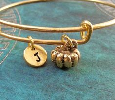 Pumpkin Bangle Bracelet Pumpkin Bracelet Pumpkin Jewelry Halloween Stackable Bangle Pumpkin Charm Br Adjustable Gold Jewelry For Halloween, Adjustable Gold Bracelets For Halloween, Halloween Bracelet Jewelry Gift, Adjustable Metal Name Bracelet With Charms, Bangle Pumpkin, Halloween Charm Bracelet Gift, Handmade Jewelry For Fall Gift, Handmade Adjustable Jewelry For Fall, Adjustable Name Bracelet With Charms