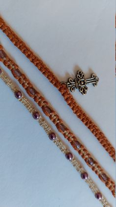 Three brown thread bracelets with balls and a cross. Made by hand. Comfortable to wear. Cotton Bracelet, Brown Bracelet, Thread Bracelets, Cross Bracelet, Braided Bracelets, Rose Buds, Friendship Bracelets, Hippie Boho, Porter