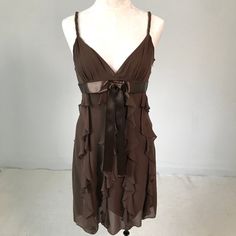 Bcbg Max Azria Tiered Ruffle Babydoll Dress In Size 6. Classic Seasonless Lightweight Silk Chiffon In Rich Brown. Lined, Adjustable Straps. 90's Vintage, Og Betsy Johnson Vibes. Fab For Weddings, Homecoming, Graduation, Dates Or Cocktails. Add Simple Pumps & Clutch For A Sexy Sweet Look! Euc 1 Only. Tag Size 6, Model 6. Fits 4. Buy 6! Flat~ 17 B 16 W 34-40 L Brown Dresses Short Mini Daytime Summer Spring Sweet Cute Party Brunch Delicate Flowy Ribbon Bow Layered Wedding Guest Minimalist Fitted Tiered Brown Dress, Fitted Brown Tiered Dress, Brown Dresses, Bcbg Max Azria, Max Azria, Betsy Johnson, Bcbgmaxazria Dresses, Brown Dress, Silk Chiffon