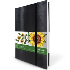 a black notebook with sunflowers and leaves on the front cover is open to show the inside pages