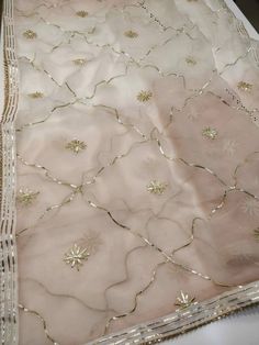 Item Overview ATHARVA Hand Embroidered/Indian Wedding Dupatta in Beige Pink/Gota Patti Jaal/Fabric Options Available w/Tassels/Duppata/Stolls/Wrap ⚘Dno. DUP4 ⚘Fabric: Soft Chiffon Chinnon Dupatta- 2.5Mts broidered Gota Patti Dupatta/ Stole/ Scarf in Black ⚘Fabric: Options Available A. Net B. Organza C. Chiffon Chinnon D. Georgette E. Tabby Silk F. Pure Chiffon (Chamandi) ⚘Length: 2.5 Mtrs ⚘Width: 1.12 Mtrs ⚘Excusive Hand Embroidered Gota Patti Work ⚘Excusive Hand Embroidered Party Wear. ⚘Customi Luxury Traditional Embroidered Fabric With Gota Work, Luxury Art Silk Embroidered Fabric With Gota Work, Luxury Dupatta With Intricate Embroidery In Dola Silk, Luxury Net Dupatta With Intricate Embroidery, Festive Dupatta With Gota Work, Luxury Gota Work Art Silk Salwar Kameez, Luxury Dola Silk Dupatta With Intricate Embroidery, Luxury Silk Thread Dupatta With Dabka Work, Luxury Resham Embroidered Silk Chiffon Dupatta