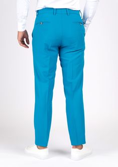 Stand out in these vibrant sapphire blue pants! Made from a stretch cotton fabric for a look that's both comfortable and vibrant, you're sure to turn heads at any event! Fitted Turquoise Bottoms For Spring, Blue Elastane Summer Pants, Turquoise Fitted Bottoms For Spring, Blue Elastane Pants For Summer, Blue Stretch Tapered Leg Bottoms, Stretch Blue Bottoms With Tapered Leg, Blue Elastane Tapered Leg Bottoms, Blue Tapered Leg Elastane Bottoms, Summer Blue Ankle-length Dress Pants