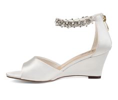 Step into a sparkling look with the Connor wedge by Journee Collection. This wedge has a beautiful shimmery material, open toe, and a jeweled ankle strap. You�ll be stunning in your new heels, and these wedges are the perfect height. Fabric upper,Zip-up closure at the back,Approx. 2 1/2 inch wedge heel,Open toe,Padded footbed for added comfort,Synthetic outsole,Jeweled ankle strap for added style | Women's Journee Collection Connor Special Occasion Shoes in White Size 7.5 Medium New Heels, Special Occasion Shoes, Bridal Women, White Sandals Heels, Occasion Shoes, Shoe Carnival, Journee Collection, Women's Pumps, Wedge Heels