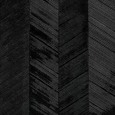 an abstract black and white background with diagonal lines in the center, as well as dark colors