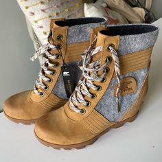 New With Tags, But Not The Box. Very Cute Cold Weather Wedge. Does Run A Little Small. Never Worn, But A Few Scuffs From Being In Storage With Other Items. Please Review All Photos Carefully Before Purchasing. Photos Are Of Actual Item And Item Is Sold As Is. Wedge Winter Boots, Sorel Wedge, Sorel Wedge Boots, Sorel Wedges, Joan Of Arctic Wedge, Short Suede Boots, Felt Boots, Leather Snow Boots, Unique Boots