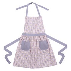 a child's apron with grey straps